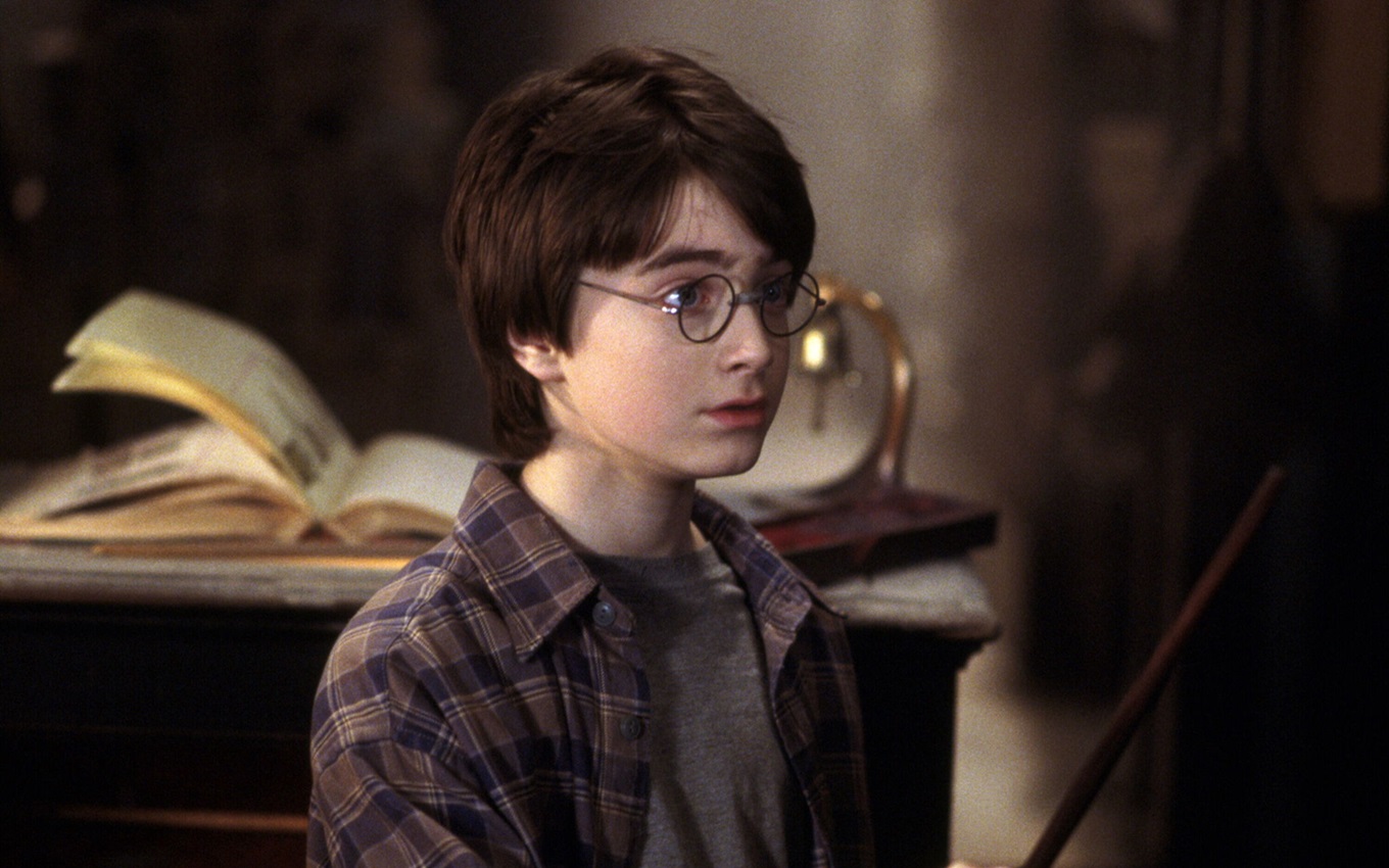 Daniel Radcliffe em cena de Harry Potter e a Pedra Filosofal