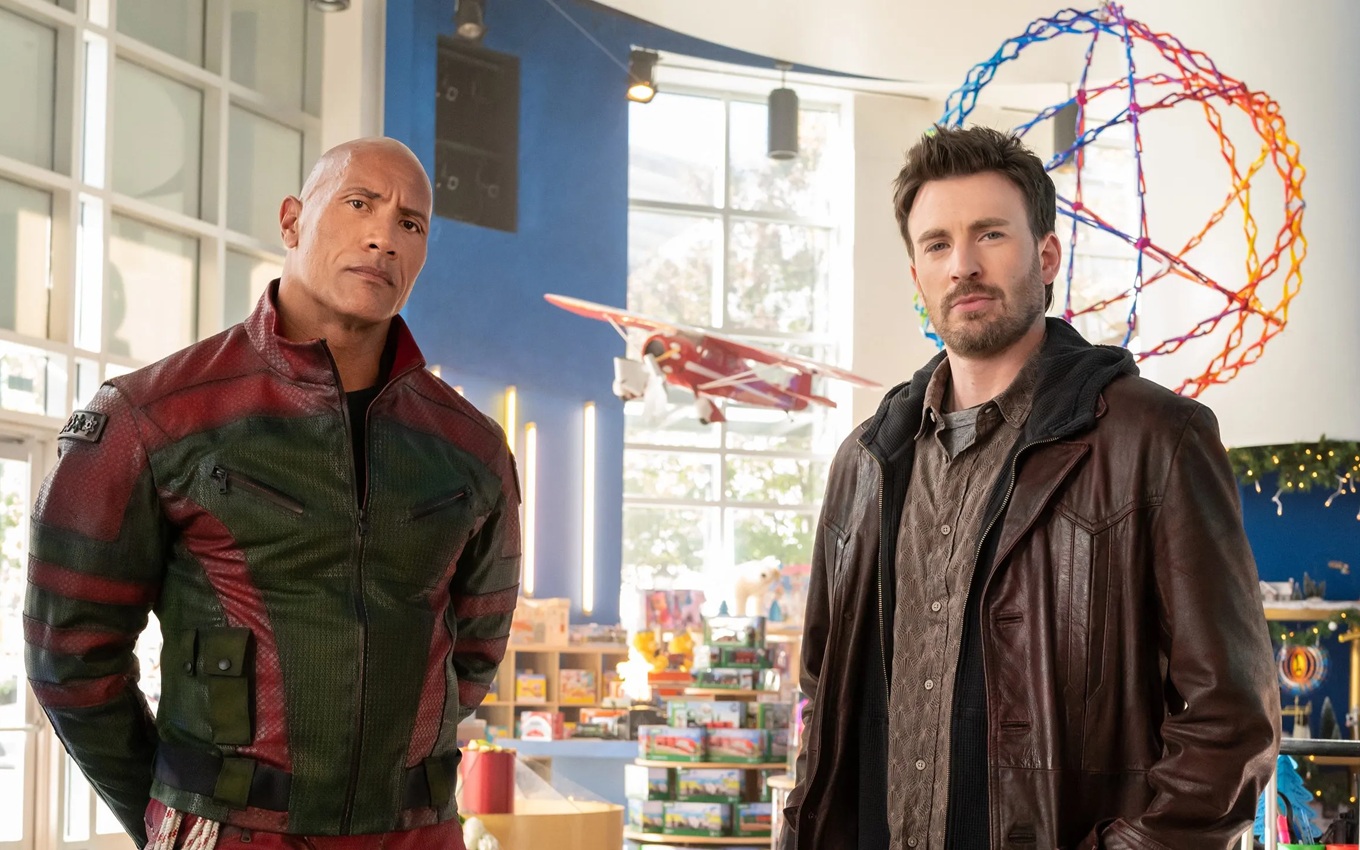 The Rock e Chris Evans em cena de Operação de Natal